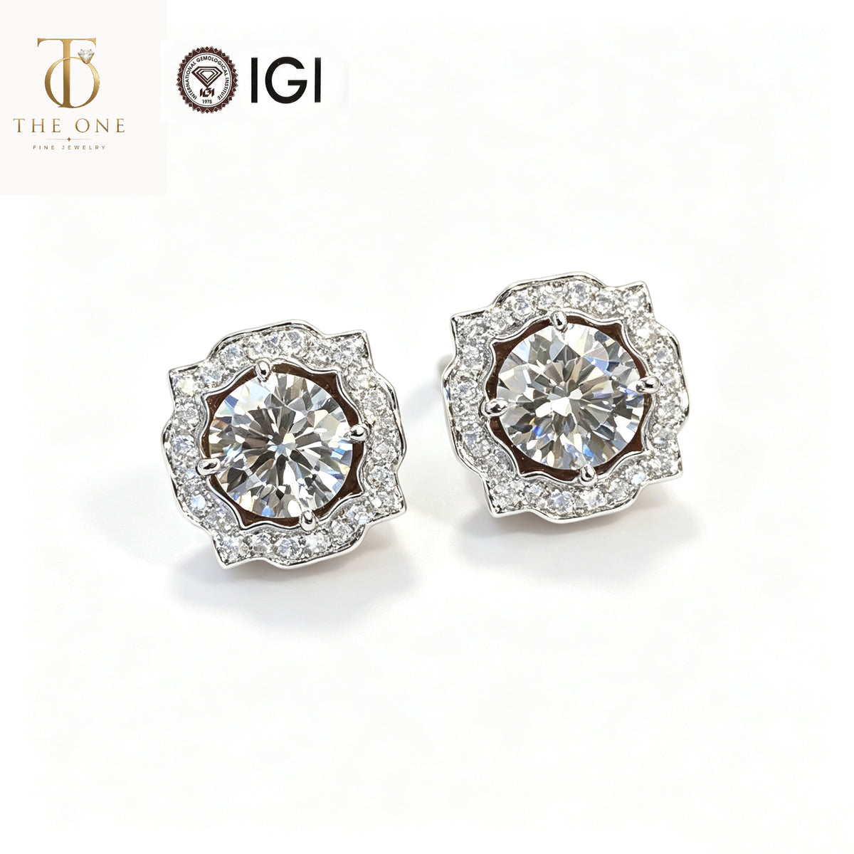 Round brilliant halo lab diamond stud earrings product shot with IGI and The One Jewelry branding