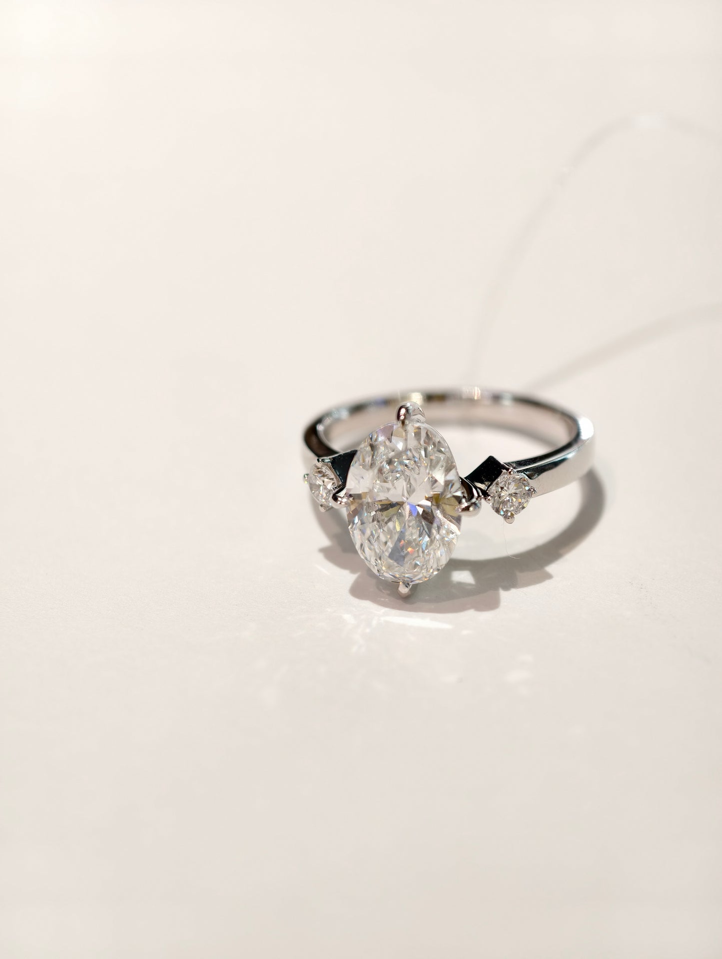 18K Gold Lab-Grown Oval Diamond Trilogy Ring | IGI Certified