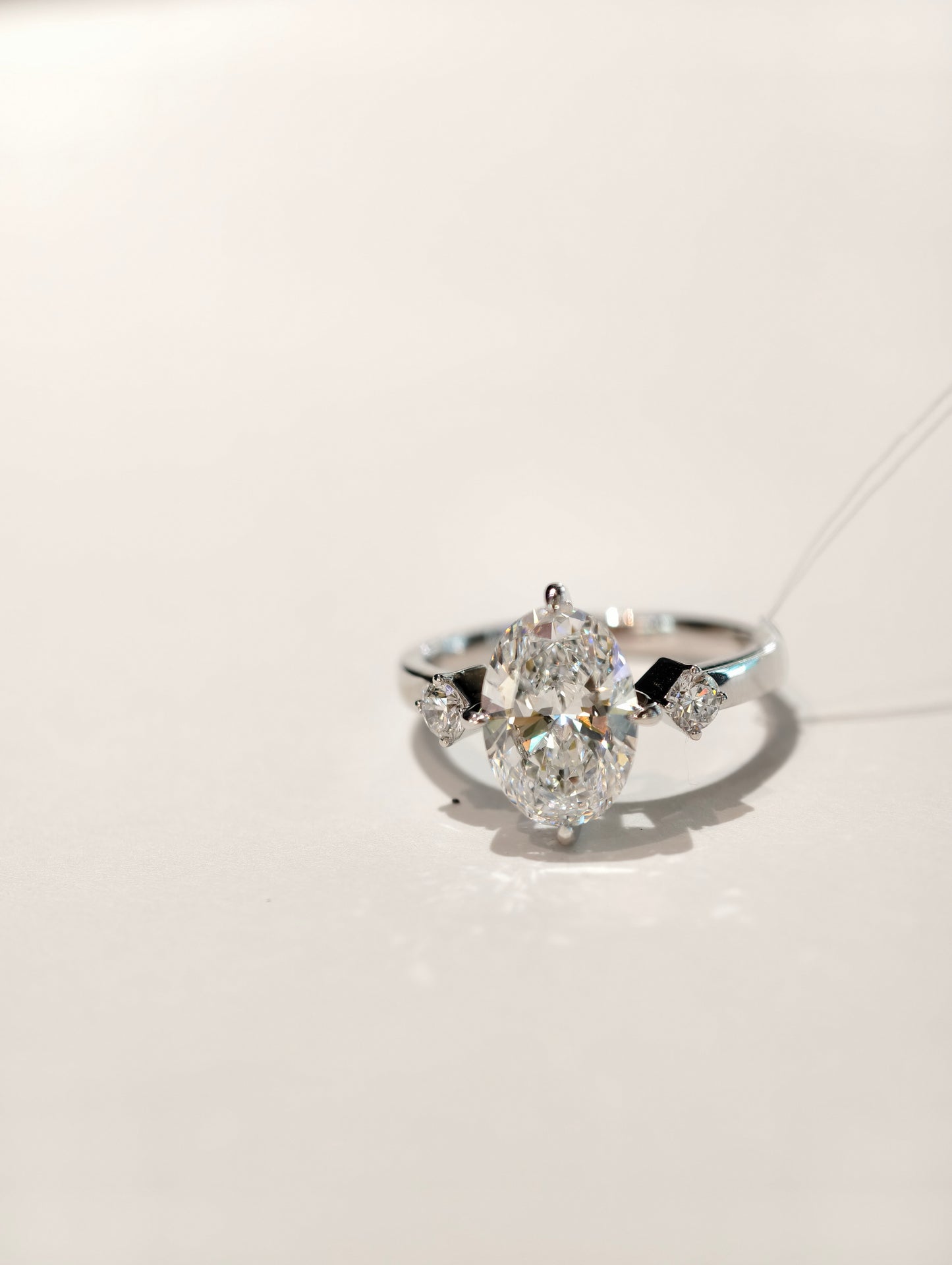 18K Gold Lab-Grown Oval Diamond Trilogy Ring | IGI Certified